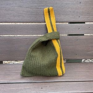 Crochet knot handbag 
Dimensions: 9L x 8H inch